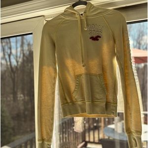 Light yellow, women’s small hollister hoodie in good condition